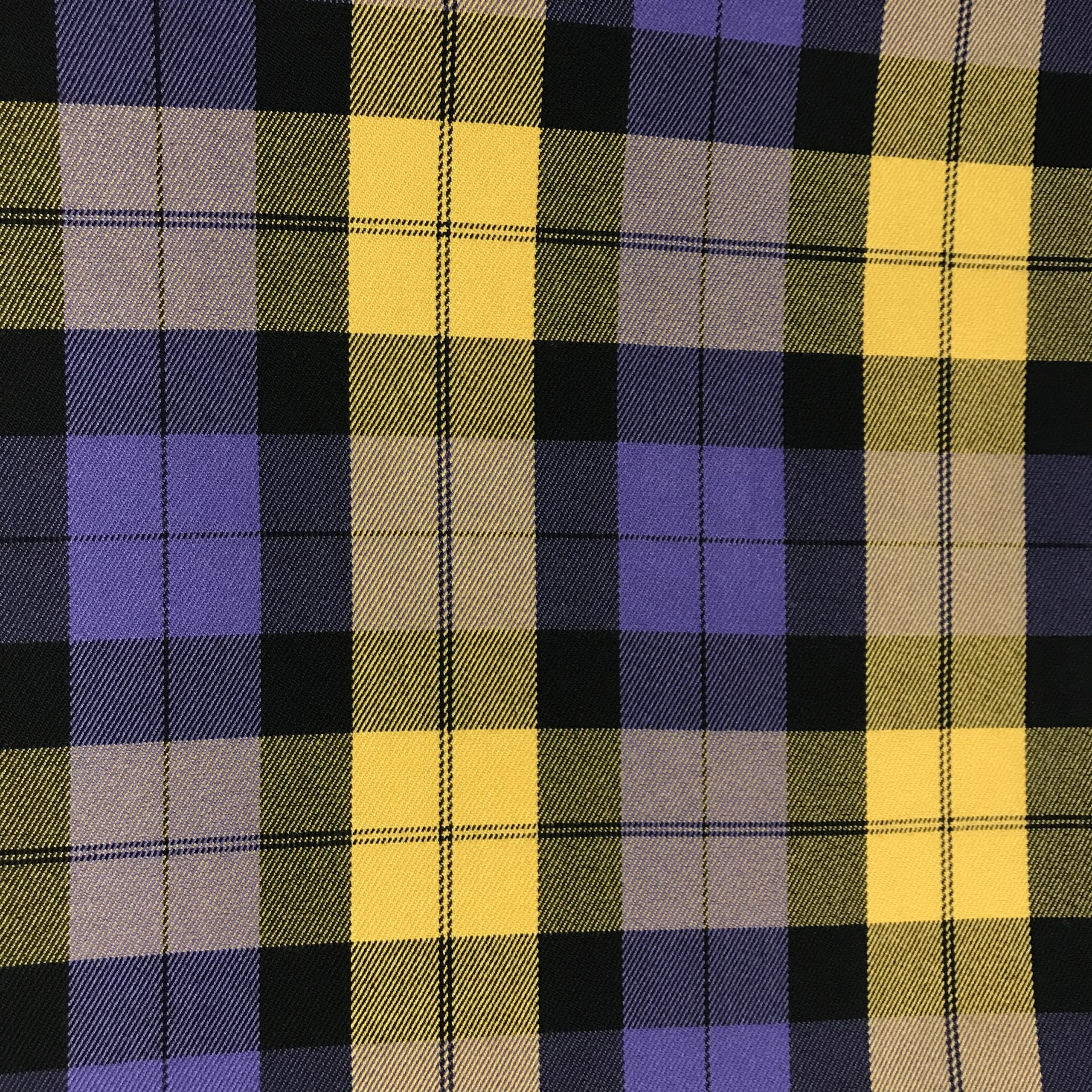 Tessuto scozzese viola e giallo